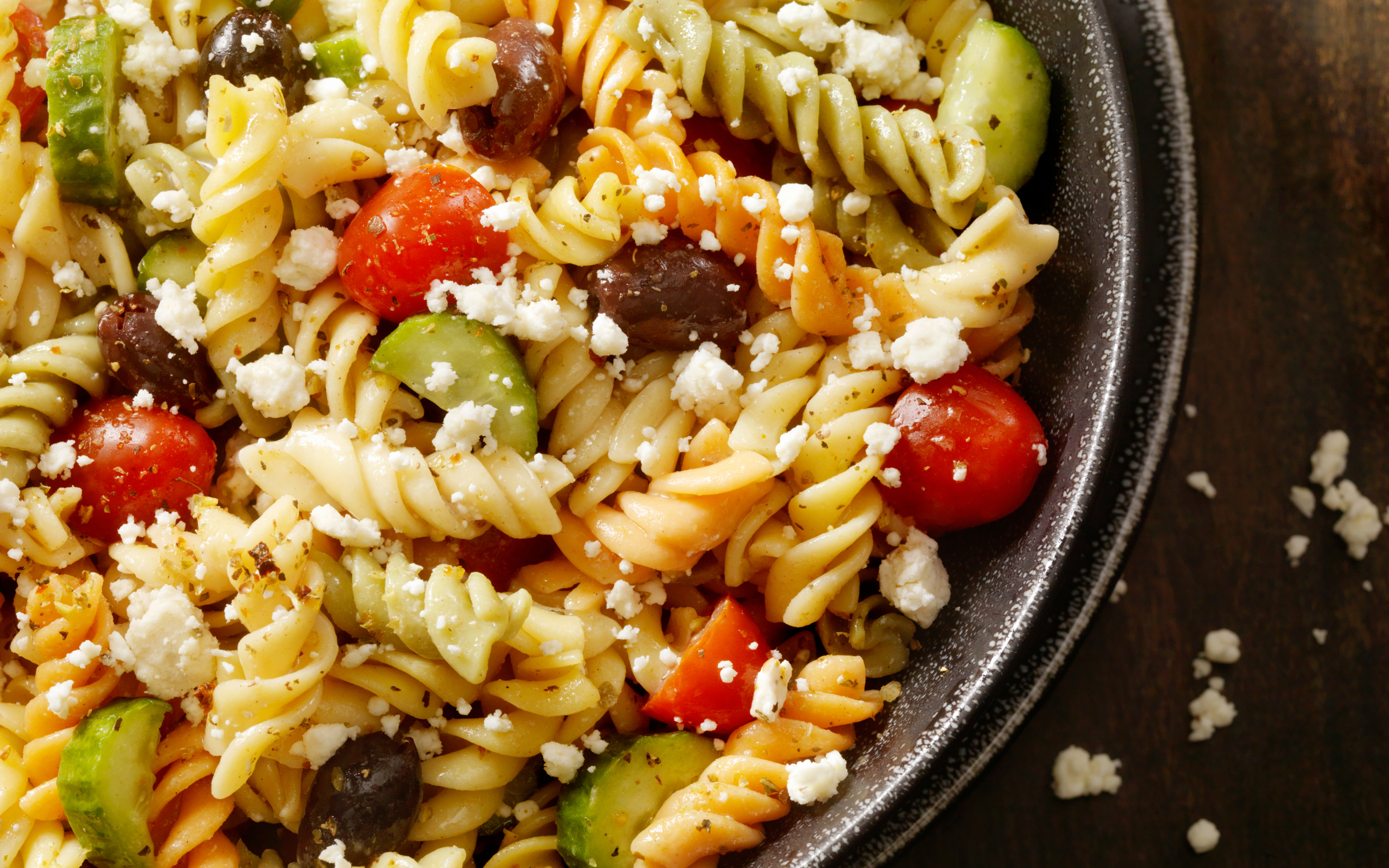 pasta salad with olives, cucumber and cherry tomatoes