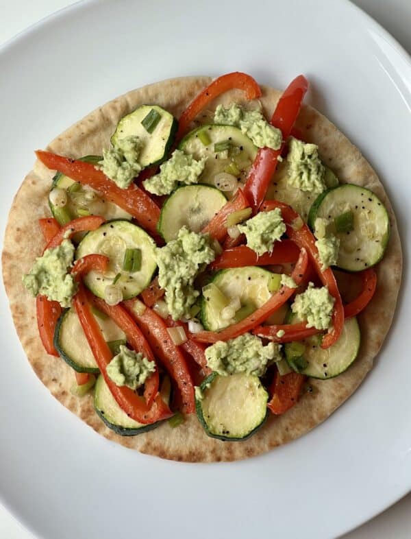 Roasted Veggies Wrap with Avocado Aioli on pita bread