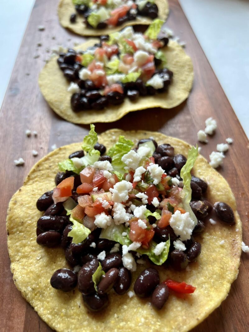 Summer Crispy Tostada, black beans, lettuce and salsa